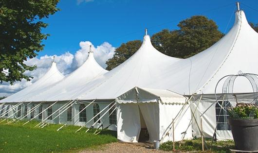 high-quality portable toilets stationed at a wedding, meeting the needs of guests throughout the outdoor reception in Blue Springs